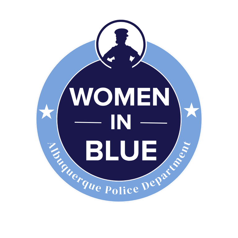 Female officers in front of police units