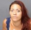 APD arrests woman, searching for man in overnight murder