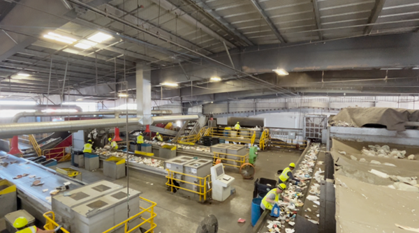Machinery sorts remaining plastics and metals from the recycling stream