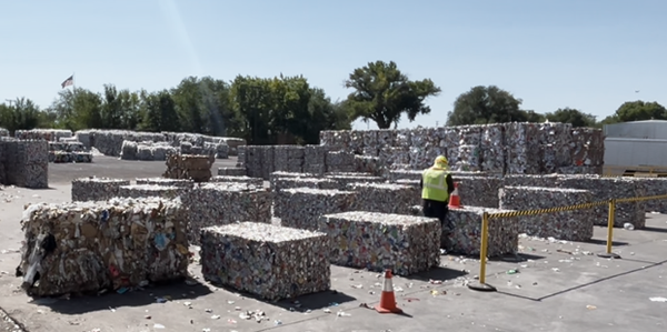 Bailed recycling awaits shipping to reprocessing facilities.