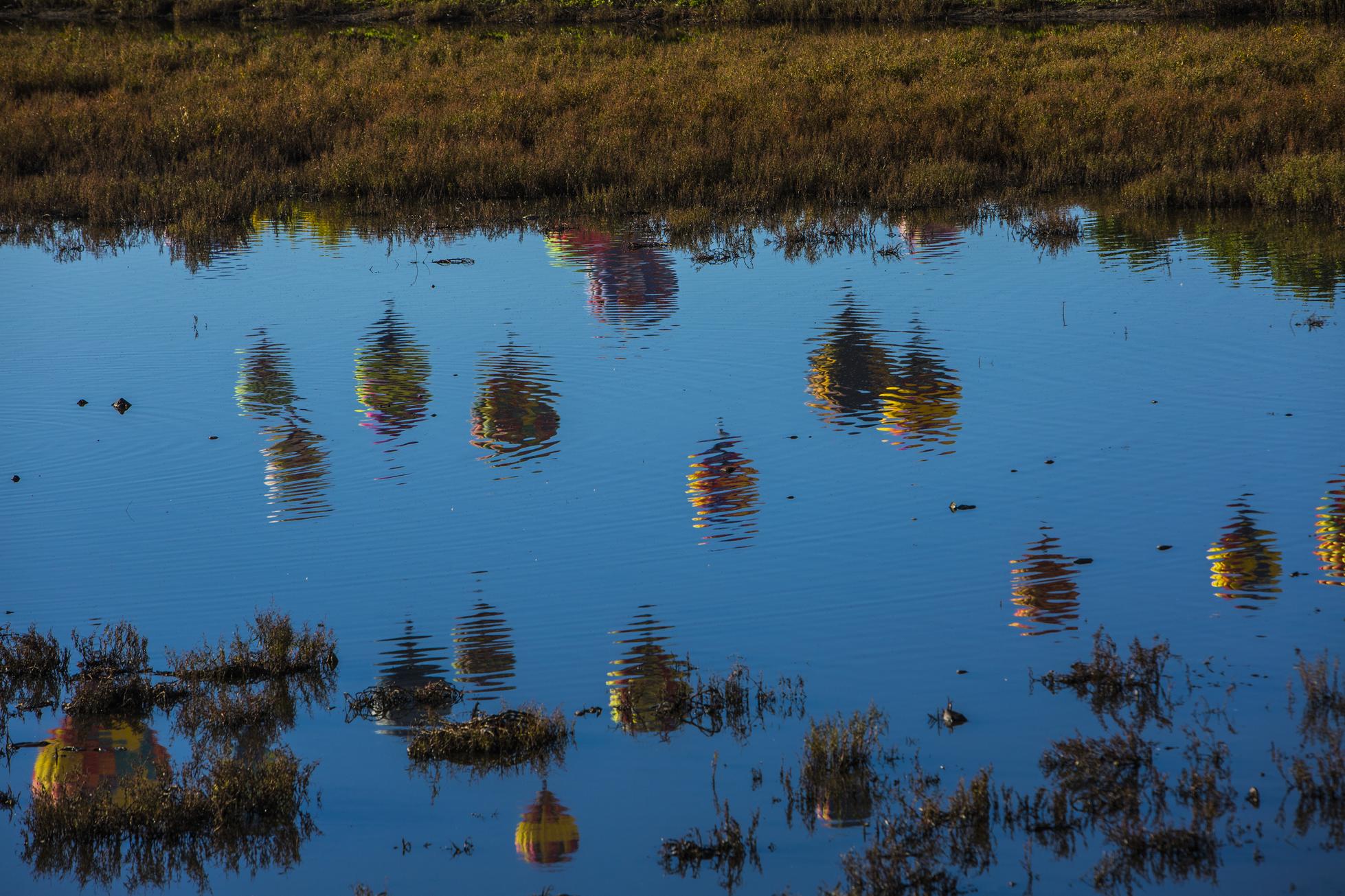Balloons Reflected in Water