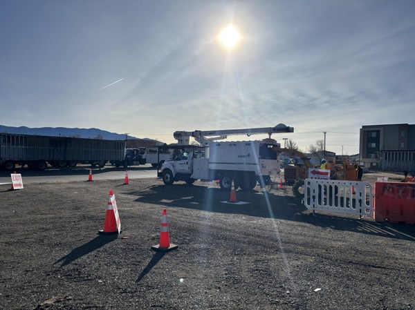 Heavy machinery is positioned at Eagle Rock Convenience Center, ready for mulching live Christmas trees.
