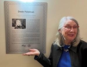 Dede Feldman Plaque Dedication Former state senetor Dede Feldman posing in front of the dedication plaque.