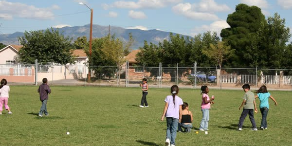 An image of children playing in a City park.