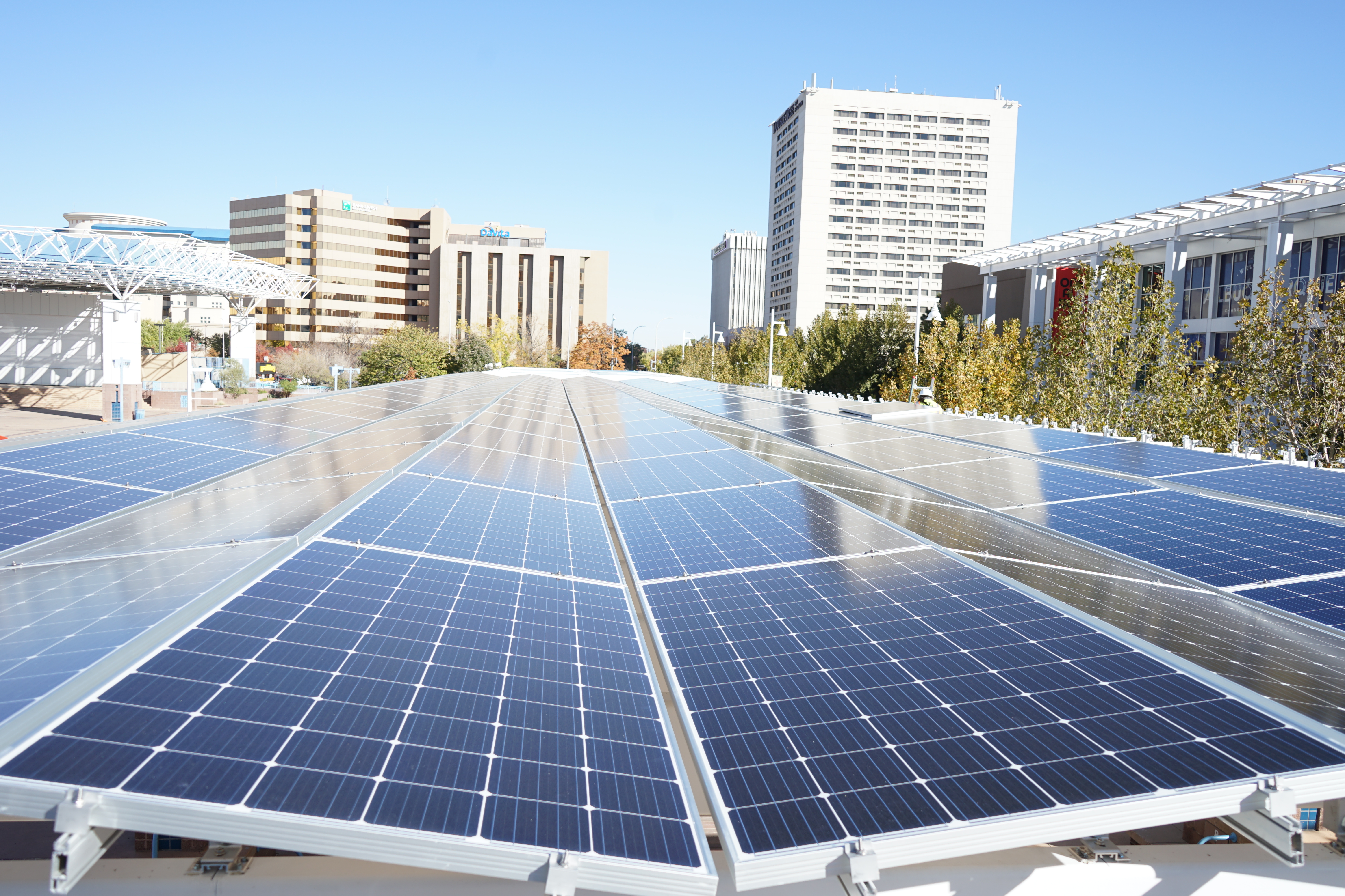 A solar panel array mounted on top of a shade structure on Civic Plaza in Downtown Albuquerque.