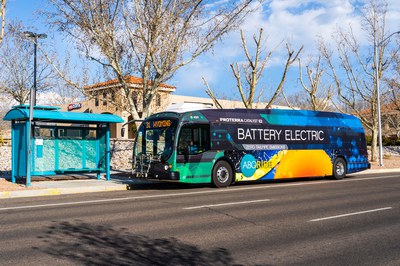 City's electric bus and bus stop on a sunny spring day