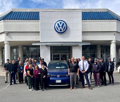 University Volkswagen Mazda team who completed the City's Electrified Dealership program.