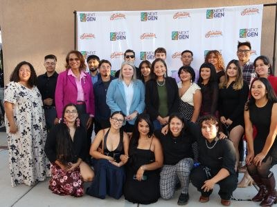 A group of students posing with City Councilors