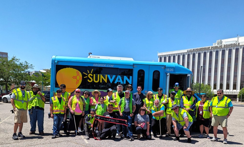 Adopt-A-Stop Cleanup Volunteers cleaning up bus stops