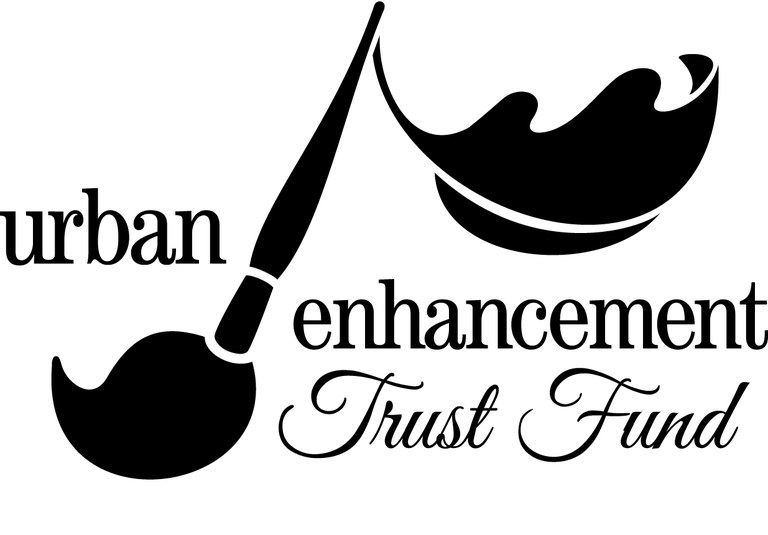 Image of a paintbrush with a leaf at the top and text that reads "Urban Enhancement Trust Fund."